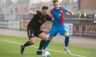 Roddy MacGregor in action for Caley Thistle.