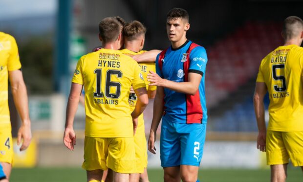 Wallace Duffy, right, is eager to show Caley Thistle's qualities in their Premier Sports Cup tie at Motherwell on Wednesday.
