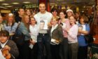 Darius alongside some of the 500 fans who joined him at his book signing in 2003.