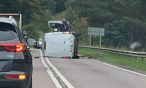 A van on its side blocked the A96 near Keith.