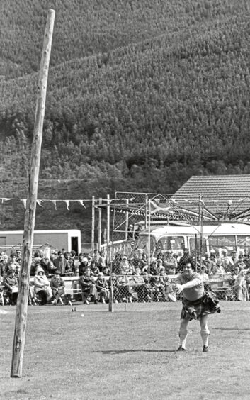 A man in a kilt after tossing the caber at the Ballater Highland Games