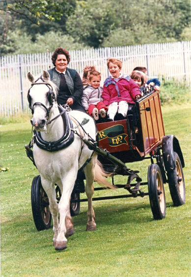 1992 - A group of children enjoy a horse-drawn ride at the Tillydrone community council gala