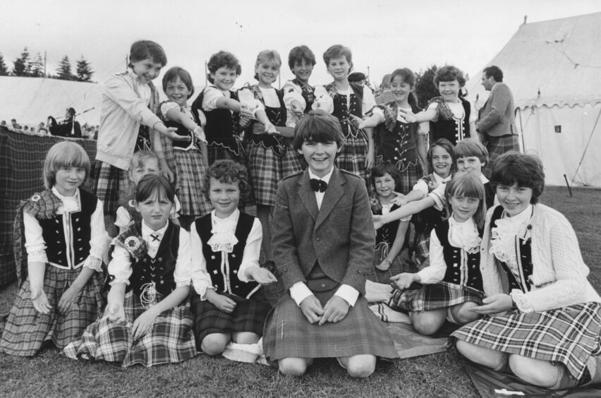 Finzean's Philip Christie (13) was the only boy competing in the Highland Dancing...but found that being the only boy in a bevy of beauties does have its moment