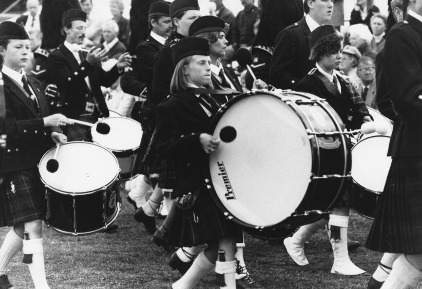 1992 - Jackie Wright (14), Aberdeen, a member of the Oldmeldrum Royal British Legion Junior Pipe Band, keeps the beat at the 125th edition of the games.