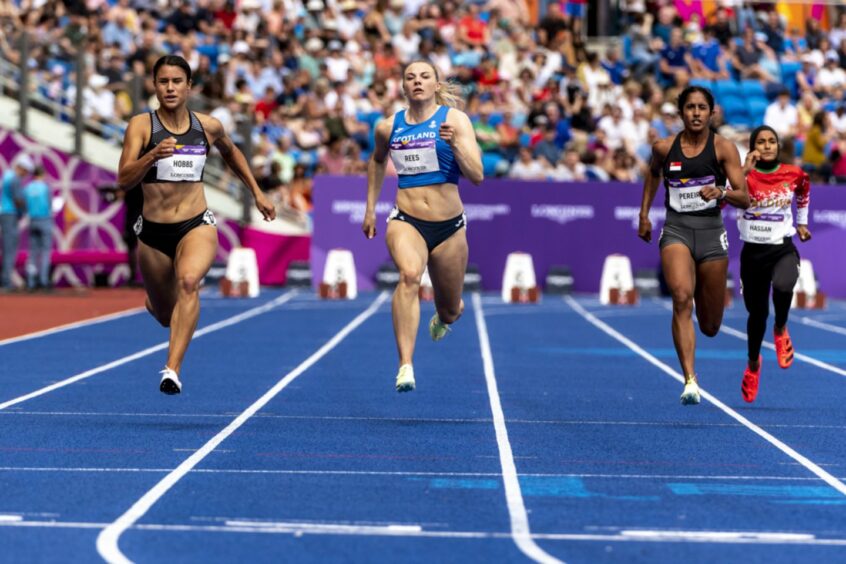 Alisha Rees in the heats of the women's 100m. Photo by Bobby Gavin