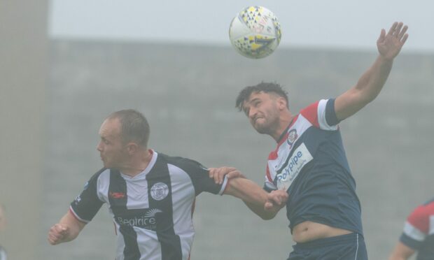 Kyle Gordon, right, in action for Turriff United in the Highland League.