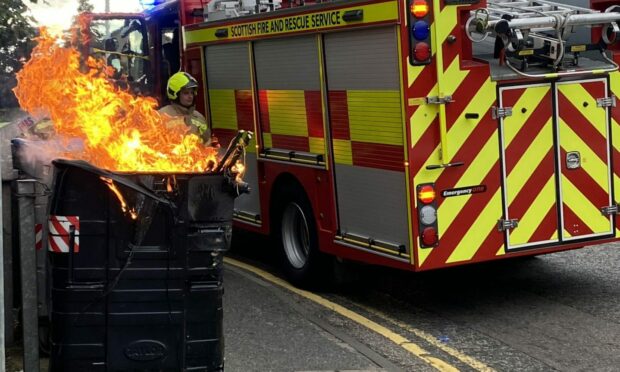 A communal bin caught fire on Belmont Road. Picture by Alastair Gammack.