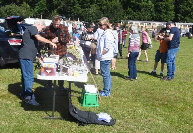 People browsing the stalls at the Affa Fine Open Air Market