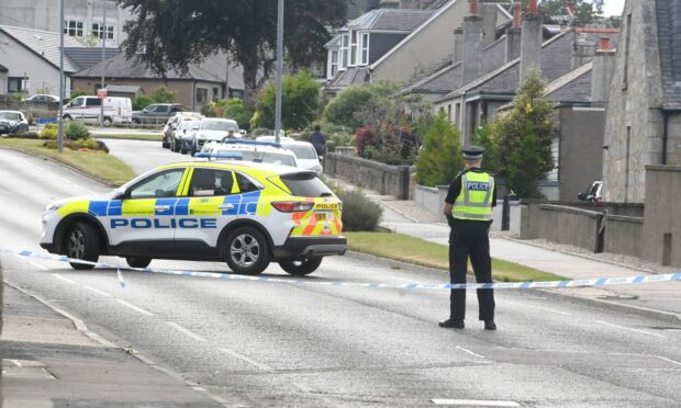Police at the scene of the disturbance on Blackhall Road on Thursday. Picture by Chris Sumner/DC Thomson.