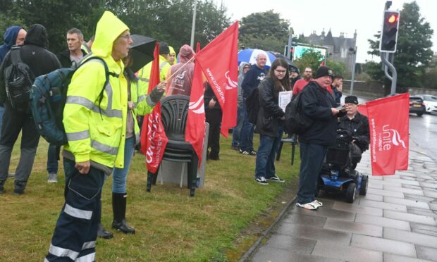 Protestors were on the picket line at 6.30am this morning. Picture by Chris Sumner.