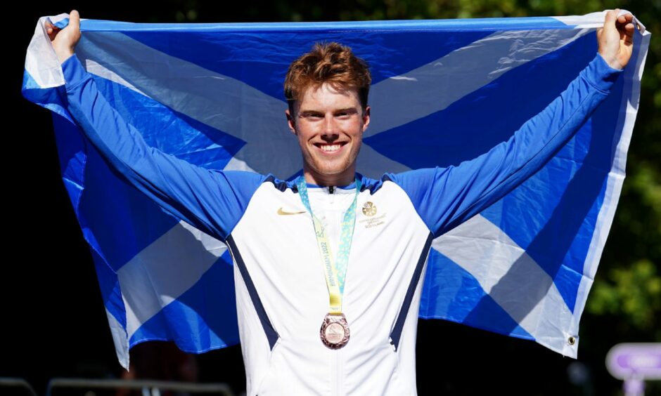Finn Crockett with his bronze medal after the men's road race. Image: PA