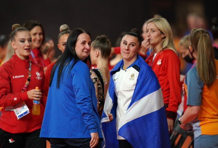 Scotland's Louise Christie (centre left) after winning silver in the Rhythmic Gymnastics. Photo by Zac Goodwin/PA Wire