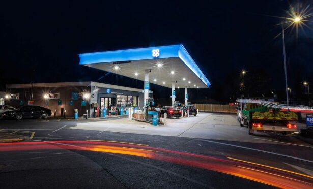 Nightime picture of Co-Op petrol forecourt.