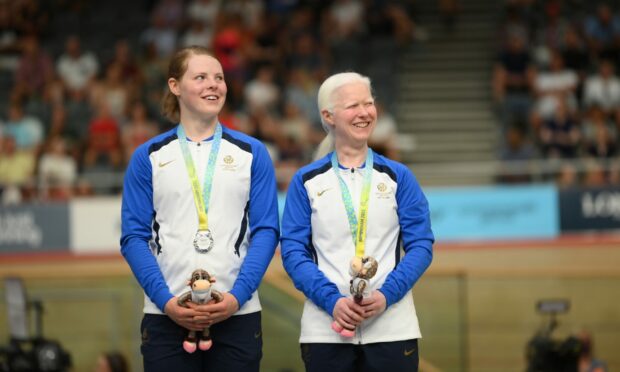 Ellie Stone and Aileen McGlynn on the podium after winning silver on the opening day of the Commonwealth Games.