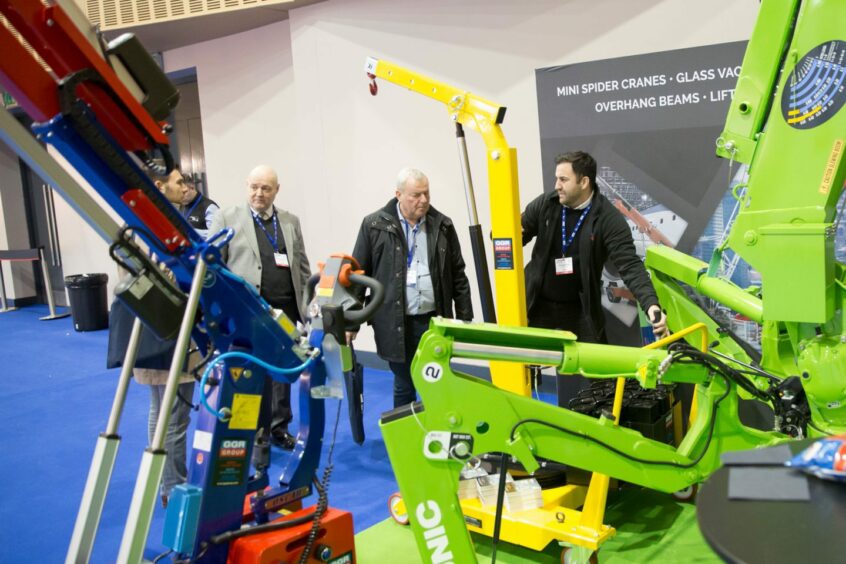 Exhibitors demonstrate the latest technologies to visitors at LiftEx