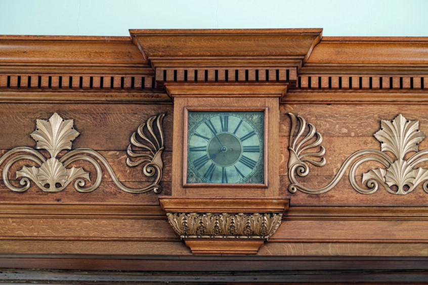 Inside the old bank: The new owner may want to keep architectural features like this ornate clock.