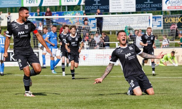 Darryl McHardy enjoys the moment after putting Elgin City 2-1 up against Stranraer. Picture by Bob Crombie
