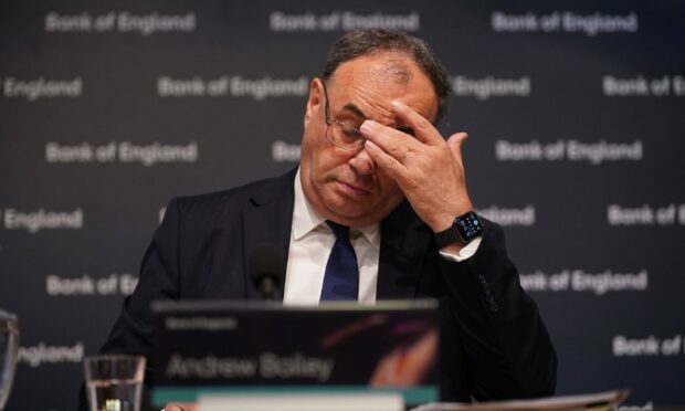 Governor of the Bank of England, Andrew Bailey feels the heat as he announced latest rise in interest rates. Yui Mok/PA Wire