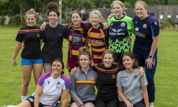 Emma Wassell, front row left, and Sarah Bonar, back row right, with Ellon rugby club's young players.