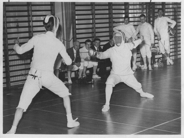 1964 - Scottish Universities champion D. Carruthers (left) and Scottish champion John King in action at the Northern District Open at the Rosemount School, Aberdeen
