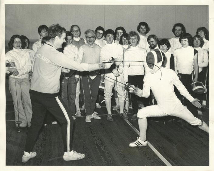 1978 - Scottish national fencing coach Prf. Bert Bracewell (left), takes on James Lamb, Aberdeen, during a coaching session for members of the Bon Accord Sword Club held at the Burgh Hall in the Woodside area of Aberdeen