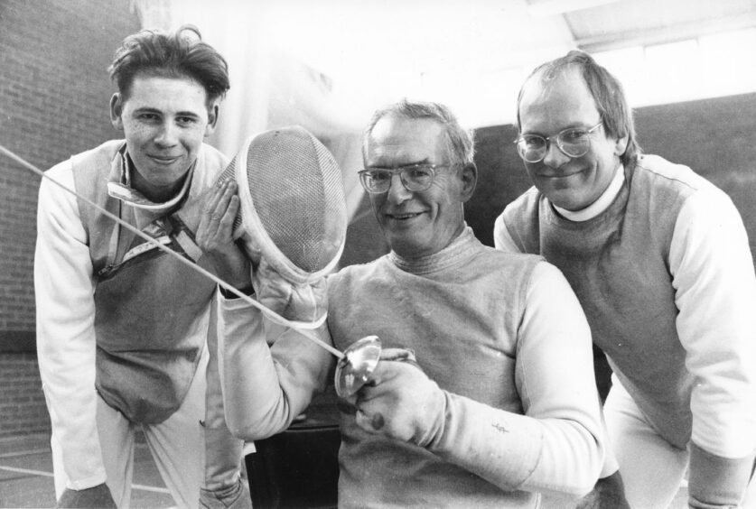 23 February 1991 - Honorary President of the Scottish Amateur Fencing Union John Fleck flanked by fellow Dingwall club members James MacRae and Alasdair Urquhart at a competition in the Butchart Centre in Aberdeen