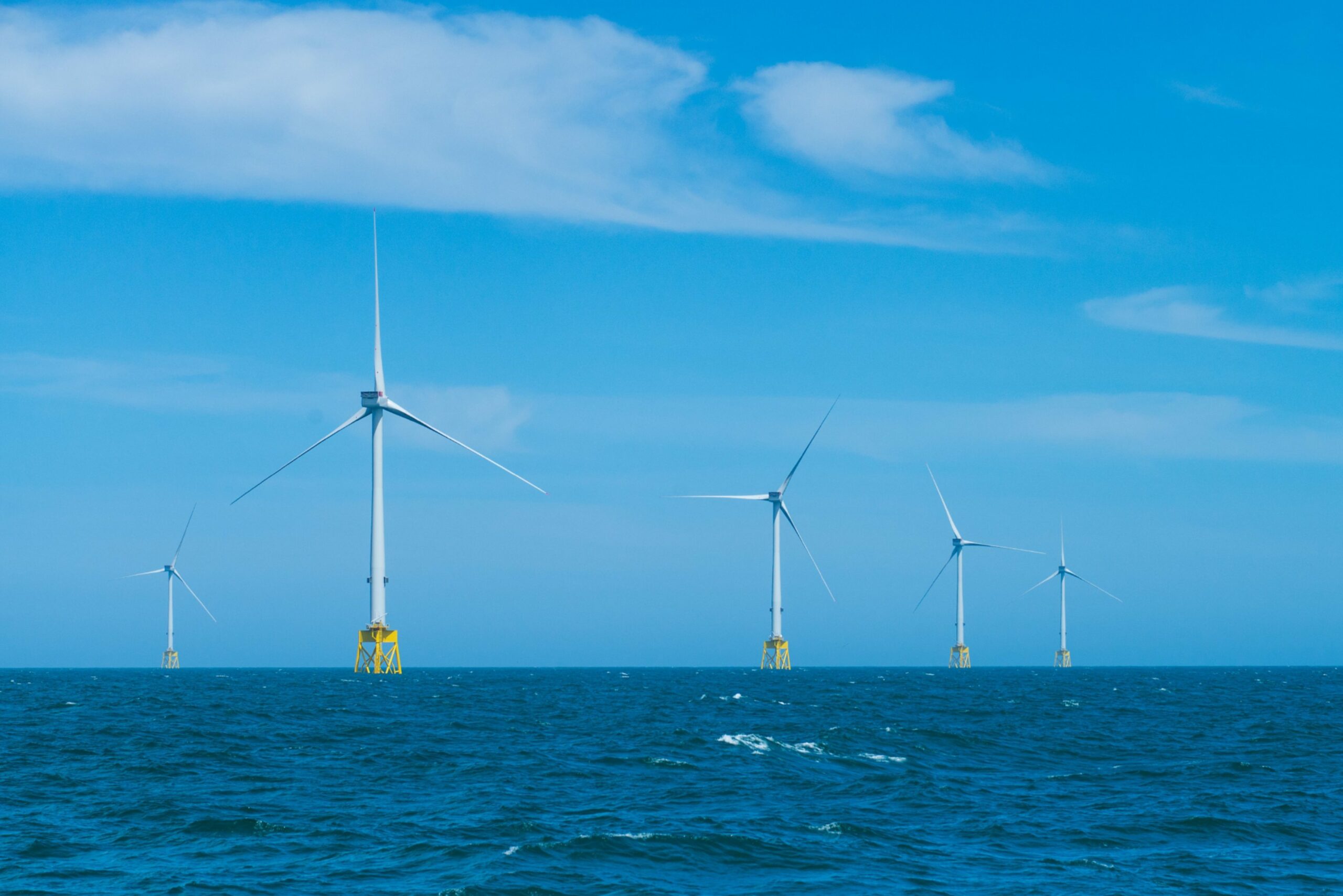 Wind turbines in sea.