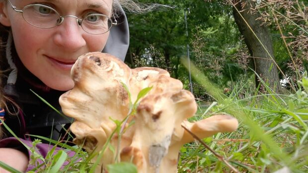 Mirjam with a giant polypore mushroom she foraged. Yum!
