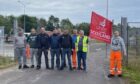 Unite members outside the Highland Council roads depot in Alness. Picture by Ross Hempseed