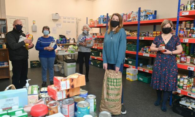 Volunteers at Moray Food Plus. Picture by Jason Hedges.