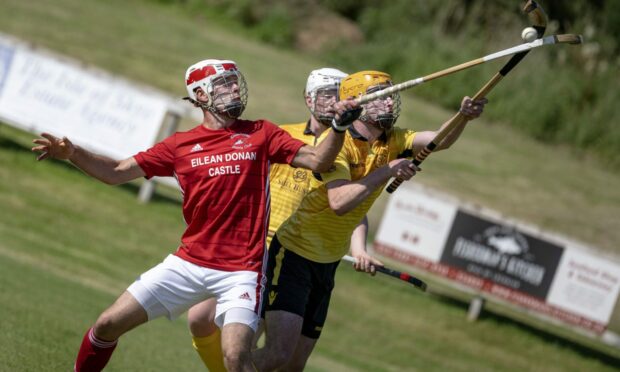 Kinlochshiel's Donald Nixon, left, competing with Fort William's Sean MacLellan. Image: Neil Paterson