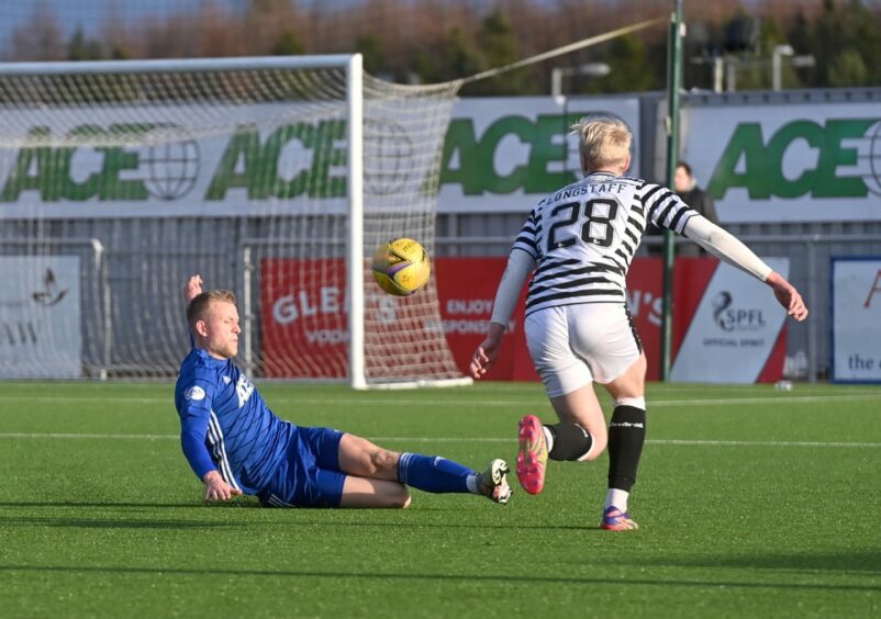 Luis Longstaff, right, in action for Queen's Park against Cove Rangers last season