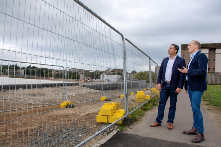 Scottish Labour leader Anas Sarwar and North East MSP Michael Marra look out over the abandoned Tillydrone Primary School building site. Picture by Kath Flannery/DCT Media.