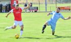 Culter's Liam Brady Todd takes a shot against Nairn. Pic by Kami Thomson.