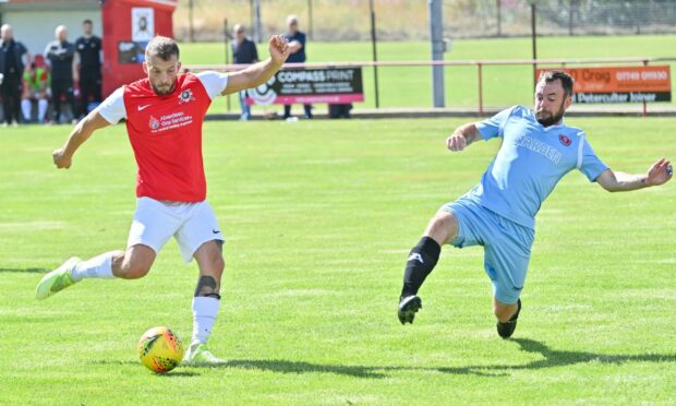 Culter's Liam Brady Todd takes a shot against Nairn. Pic by Kami Thomson.