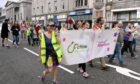 Cfine was among the charities to march down Union Street as part of Celebrate Aberdeen. Image: Kami Thomson / DC Thomson.