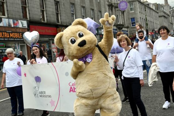 A variety of groups took to the streets, including charities Charlie House, Clan and Friends of the Neuro Ward. Picture by Kami Thomson.