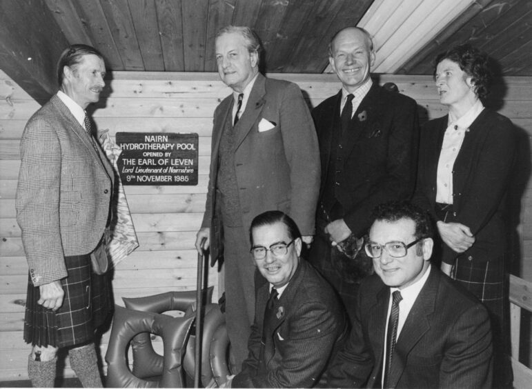 Picture shows; The Nairn Hydrotherapy Pool in November 1985 being officially opened by the Earl of Leven, Lord Lieutenant of Nairn (left), watched by pool trustees (from left) Lord Campbell of Croy, Alastair MacGregor, Lady Leven and (front) Dr Bryce Stewart, Nairn, and Eric McFee, Royal Bank of Scotland, Nairn. Picture by Ken MacPherson.. Unknown. Supplied by Ken MacPherson