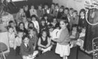 1987 - Jennie Milne, 5, and fellow P1 pupils learning about telling the time.