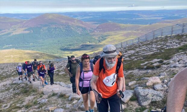 Nick Gardner scaled the last of Scotland's 282 Munros on Saturday alongside a strong team of supporters.