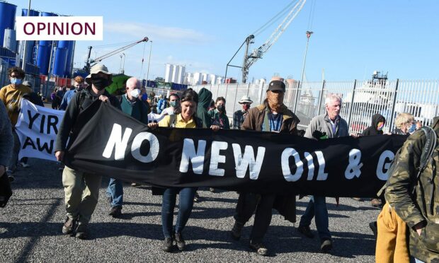 Protesters from the Aberdeen climate camp leaving the Port of Aberdeen after their sit-in activism. Photo: Paul Glendell.