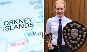 Kirkwall Grammar School student Courtney Russell with her head teacher award and Peter Higgs Science Award that she earned this year.