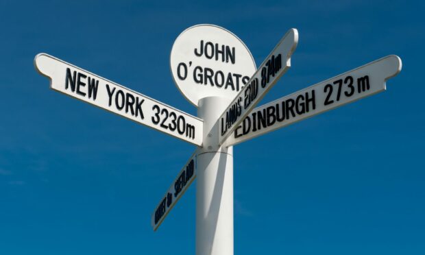 The milepost sign at John o' Groats on the north-eastern tip of the UK mainland.