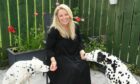 Julie Hunter of Spotlessly Chic with her own dogs Cielo and Cooper. Picture by Paul Glendell.