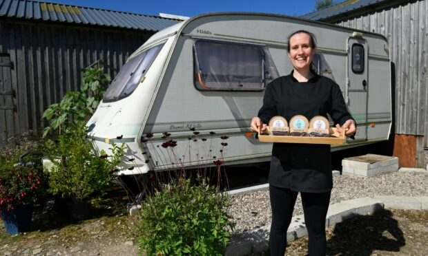 CR0037371
  St Fergus   Peterhead   AB42 3BY 

The Green Cocoa Team - Rachel Widger has set up her own chocolate company from a caravan on the front lawn outside her home. 

Pictiured is Rachel with a tray of chocolates and chocolate bars outsiide the caravan where she makes them

Picture by Paul Glendell     11/08/2022