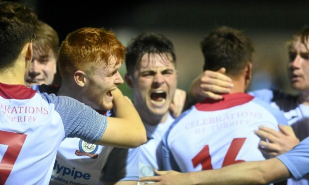 Turrif celebrate after Rory Brown scores the equaliser. Picture by Paul Glendell