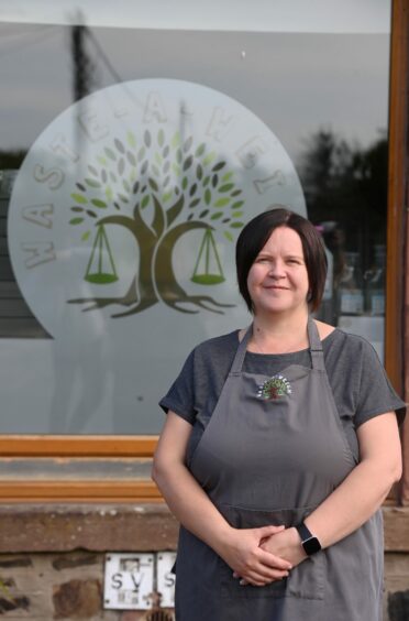 Jenni standing outside her zero waste shop