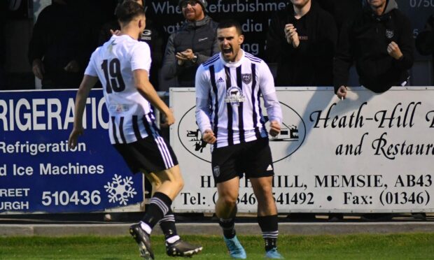 Kyle MacLeod, centre, celebrates scoring Buckie Thistle's equaliser against Rothes
