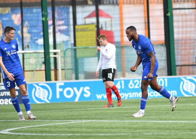 Ola Adeyemo celebrates his first goal for Peterhead against Clyde. Photo by Duncan Brown