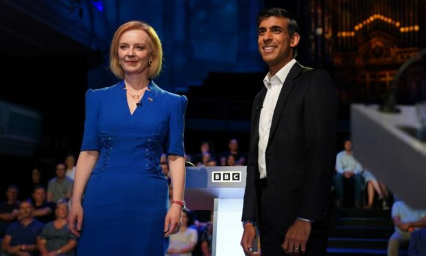 Liz Truss and Rishi Sunak before taking part in the BBC Tory leadership debate live. Our Next Prime Minister, presented by Sophie Raworth, a head-to-head debate at Victoria Hall in Hanley, Stoke-on-Trent, between the Conservative party leadership candidates. Picture date: Monday July 25, 2022. PA Photo. See PA story POLITICS Tories. Photo credit should read: Jacob King/PA Wire